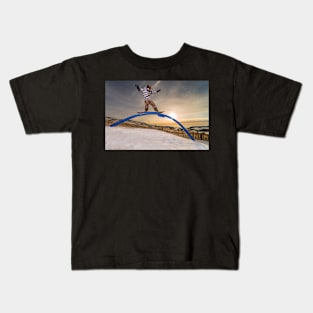 Snowboarder sliding on a rail Kids T-Shirt